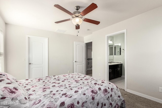 20709 W Delaney Dr, Buckeye, AZ 85396 - bedroom featuring carpet floors, connected bathroom, and a ceiling fan