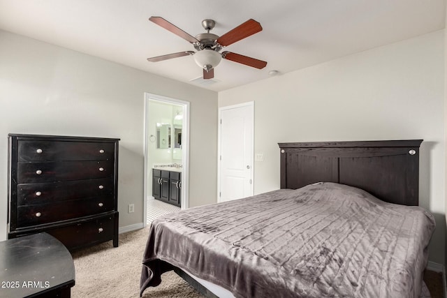 20709 W Delaney Dr, Buckeye, AZ 85396 - bedroom with light colored carpet, ensuite bathroom, and ceiling fan