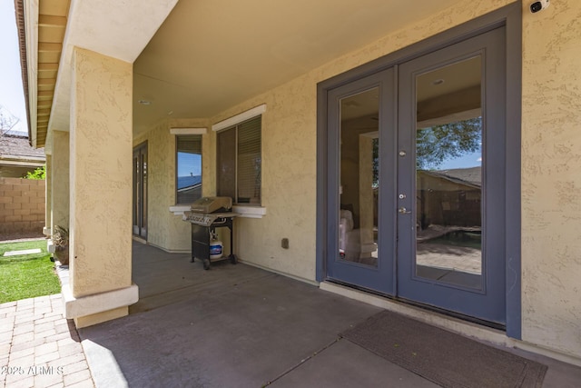 20709 W Delaney Dr, Buckeye, AZ 85396 - view of patio / terrace with french doors and a grill