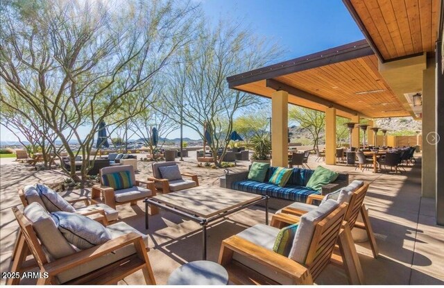 20709 W Delaney Dr, Buckeye, AZ 85396 - view of patio with an outdoor living space and outdoor dining space