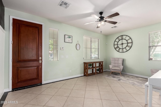 20709 W Delaney Dr, Buckeye, AZ 85396 - entrance foyer featuring a ceiling fan and baseboards