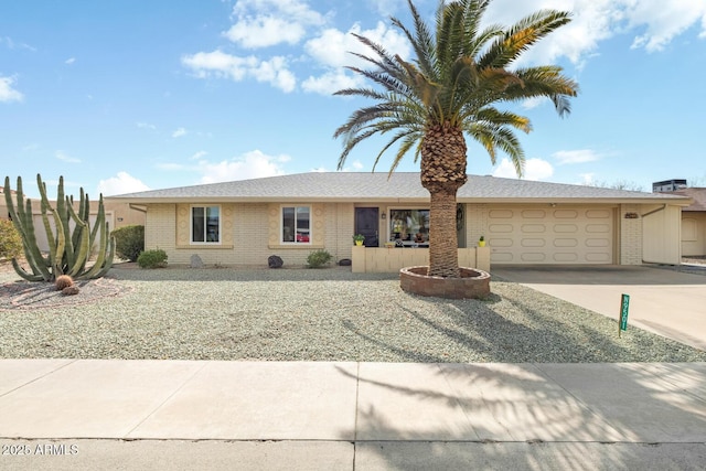 single story home with a garage