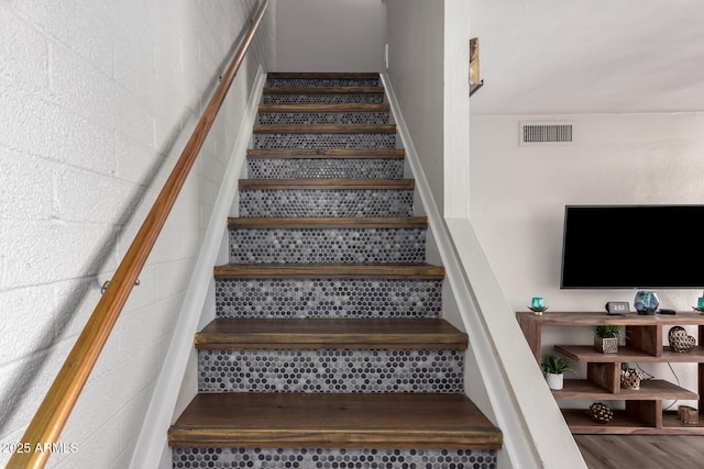 staircase with visible vents