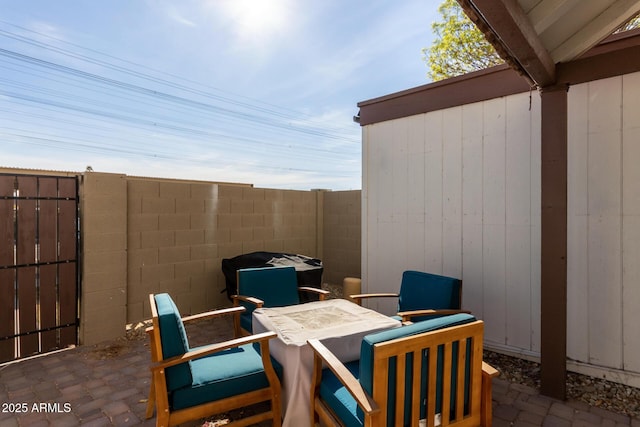 view of patio / terrace with fence