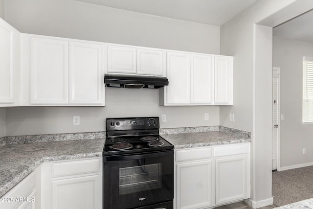 810 E Agua Fria Ln, Avondale, AZ 85323 - kitchen with electric range, light countertops, white cabinetry, and under cabinet range hood