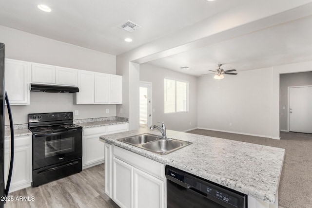 810 E Agua Fria Ln, Avondale, AZ 85323 - kitchen featuring a sink, white cabinetry, under cabinet range hood, visible vents, and black appliances