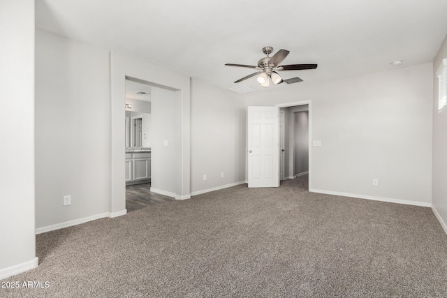 810 E Agua Fria Ln, Avondale, AZ 85323 - interior space featuring baseboards, carpet flooring, visible vents, and ensuite bath