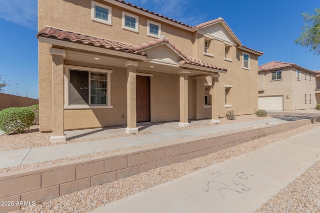 810 E Agua Fria Ln, Avondale, AZ 85323 - mediterranean / spanish house featuring a tile roof and stucco siding