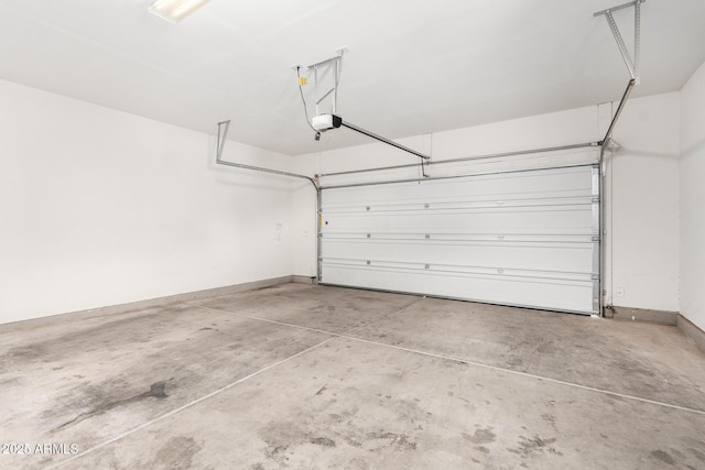 810 E Agua Fria Ln, Avondale, AZ 85323 - garage with baseboards and a garage door opener