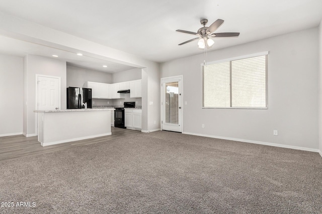 810 E Agua Fria Ln, Avondale, AZ 85323 - unfurnished living room with recessed lighting, carpet floors, baseboards, and ceiling fan