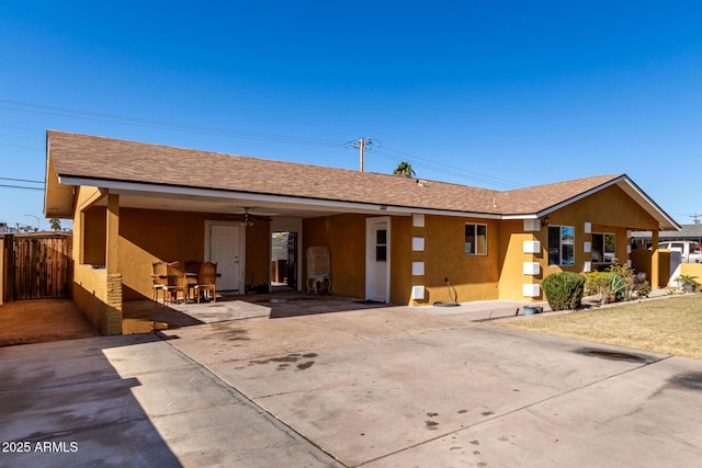 exterior space featuring ceiling fan and a patio