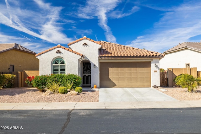 mediterranean / spanish-style house featuring a garage