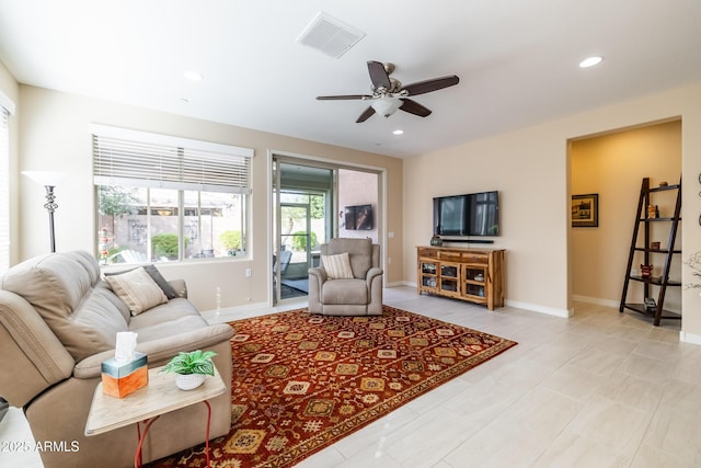 living room featuring ceiling fan