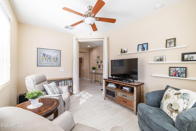 living room with ceiling fan