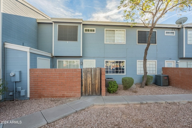 2301 E University Dr Unit 339, Mesa, AZ 85213 - view of front of home with cooling unit and a gate