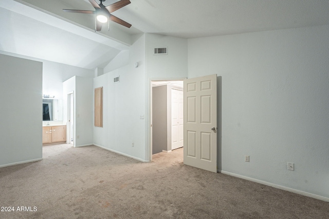 2301 E University Dr Unit 339, Mesa, AZ 85213 - unfurnished bedroom featuring light colored carpet, baseboards, ensuite bath, high vaulted ceiling, and a ceiling fan