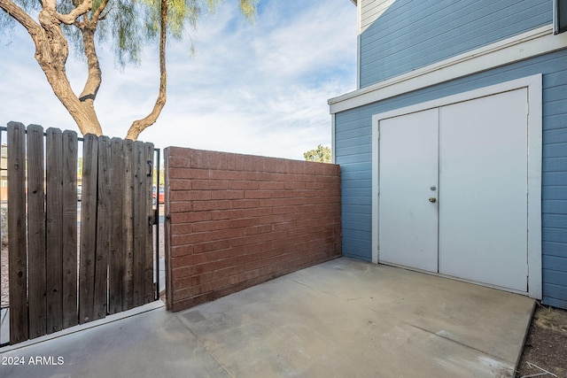 2301 E University Dr Unit 339, Mesa, AZ 85213 - view of patio / terrace with a gate