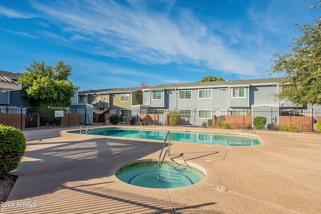 2301 E University Dr Unit 339, Mesa, AZ 85213 - community pool featuring a hot tub, a patio, and a residential view