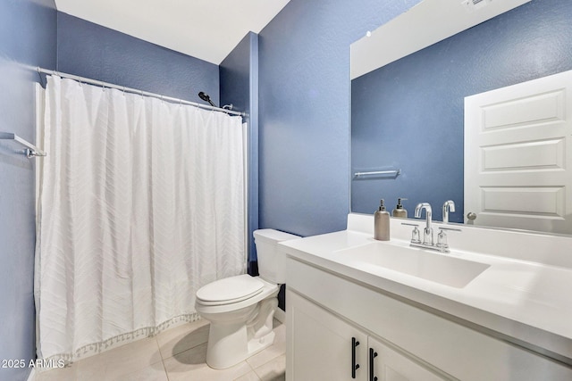 full bath featuring vanity, tile patterned floors, toilet, and curtained shower