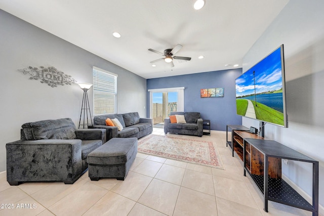 living room with a ceiling fan, baseboards, recessed lighting, and light tile patterned floors