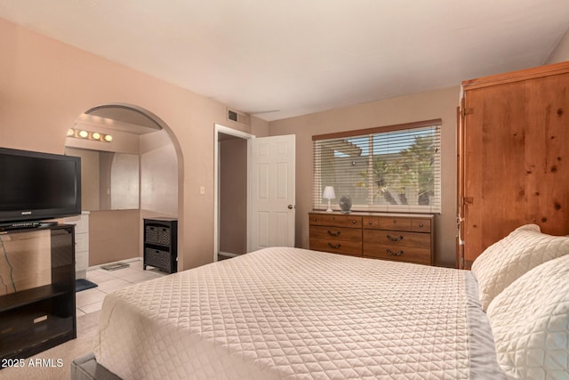 1382 N Tamarisk Dr, Chandler, AZ 85224 - bedroom with arched walkways and light tile patterned floors