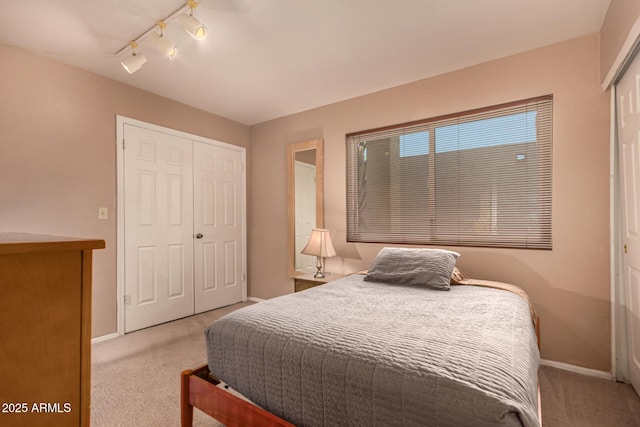 1382 N Tamarisk Dr, Chandler, AZ 85224 - carpeted bedroom featuring a closet and track lighting