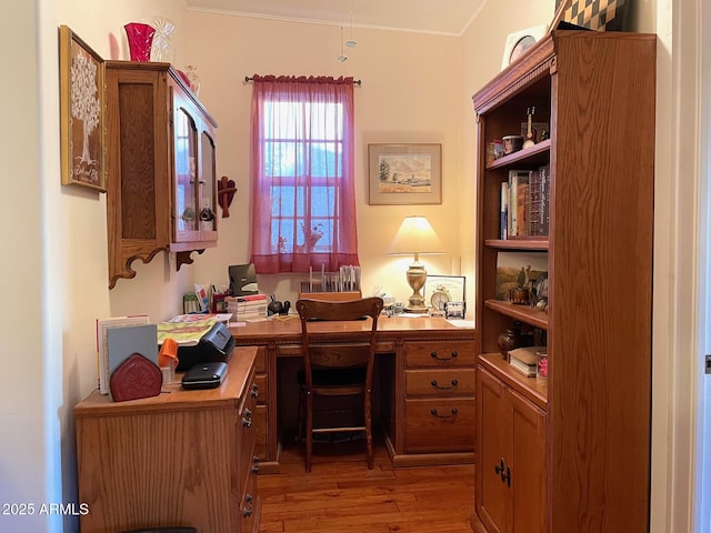 office with light wood-type flooring