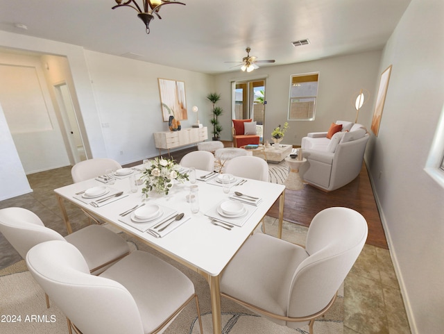 dining space with ceiling fan