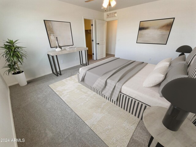 carpeted bedroom featuring a spacious closet