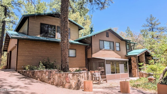 167 E Belluzzi Blvd, Payson, AZ 85541 - rear view of house featuring a sunroom and metal roof