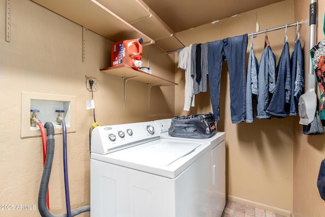 laundry area with separate washer and dryer