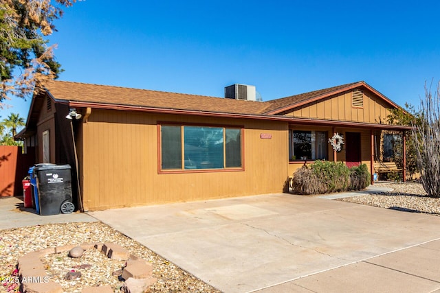 ranch-style home featuring central AC