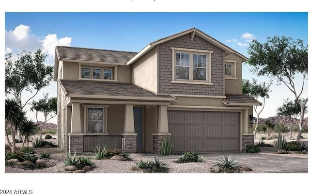 craftsman inspired home with covered porch and a garage