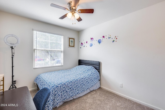 4218 W Palace Station Rd, New River, AZ 85087 - bedroom featuring carpet flooring, baseboards, and a ceiling fan