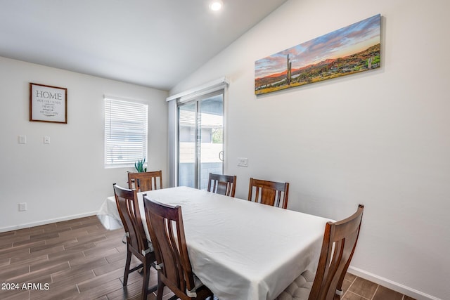4218 W Palace Station Rd, New River, AZ 85087 - dining space with baseboards, dark wood-style flooring, recessed lighting, and vaulted ceiling