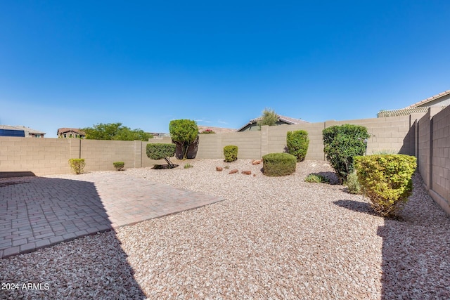 4218 W Palace Station Rd, New River, AZ 85087 - fenced backyard with a patio