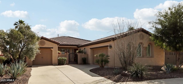 mediterranean / spanish-style house featuring a garage