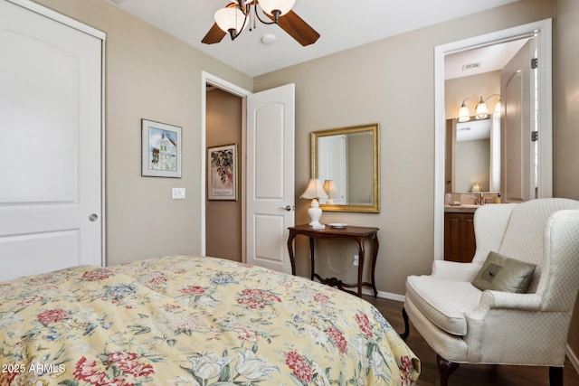 bedroom with ceiling fan, wood-type flooring, connected bathroom, and a closet