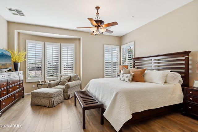 bedroom featuring ceiling fan and light wood-type flooring