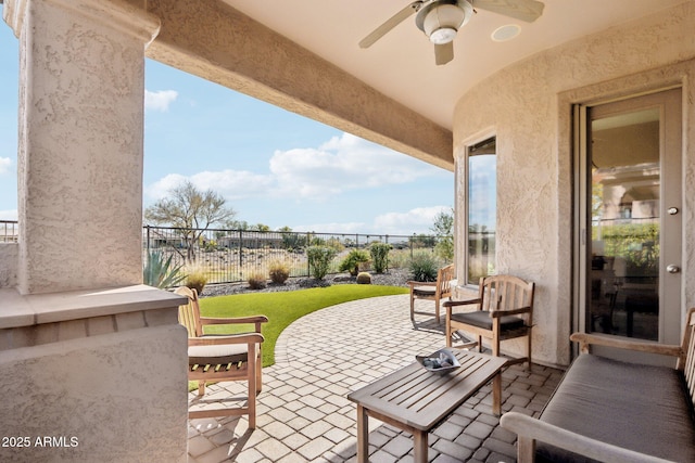 view of patio / terrace featuring ceiling fan