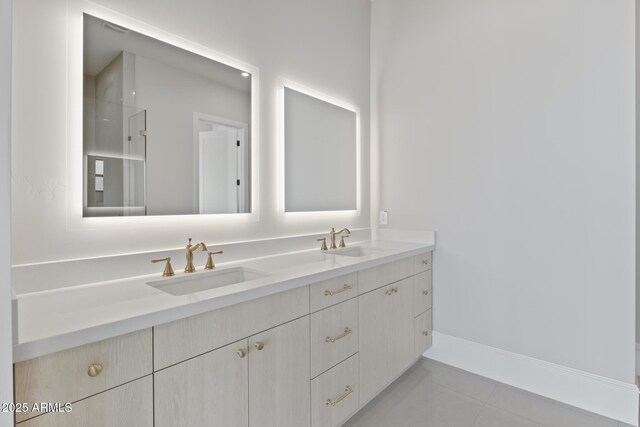 8503 S 9th Dr Unit 17, Phoenix, AZ 85041 - full bath with double vanity, tile patterned floors, and a shower