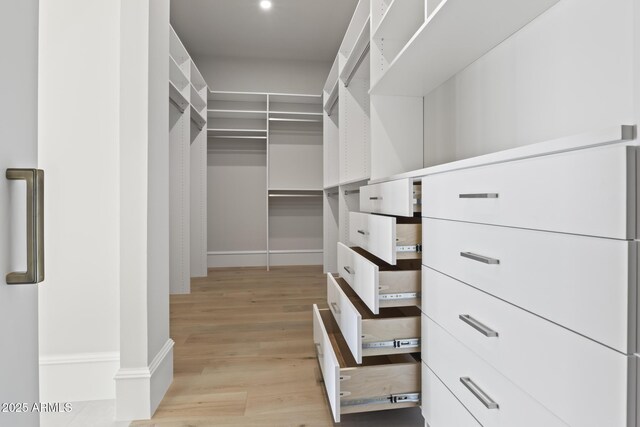 8503 S 9th Dr Unit 17, Phoenix, AZ 85041 - spacious closet featuring wood finished floors