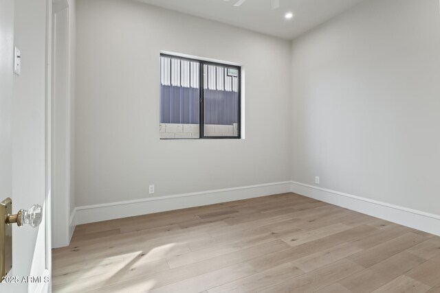 8503 S 9th Dr Unit 17, Phoenix, AZ 85041 - empty room with light wood-style floors, baseboards, a ceiling fan, and recessed lighting