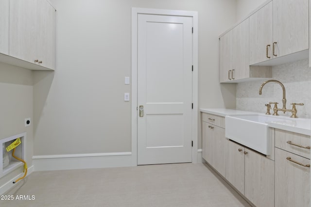 8503 S 9th Dr Unit 17, Phoenix, AZ 85041 - laundry area featuring cabinet space and electric dryer hookup