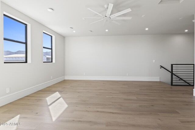 8503 S 9th Dr Unit 17, Phoenix, AZ 85041 - unfurnished room with recessed lighting, baseboards, light wood-style floors, and ceiling fan
