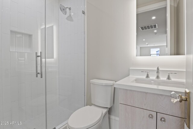 8503 S 9th Dr Unit 17, Phoenix, AZ 85041 - bathroom featuring toilet, a stall shower, and vanity