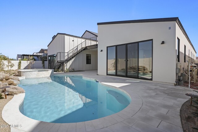 8503 S 9th Dr Unit 17, Phoenix, AZ 85041 - view of pool featuring stairs, a patio area, and a pool with connected hot tub