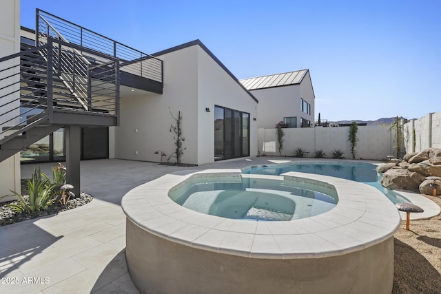8503 S 9th Dr Unit 17, Phoenix, AZ 85041 - view of pool featuring an in-ground hot tub, a patio area, and fence