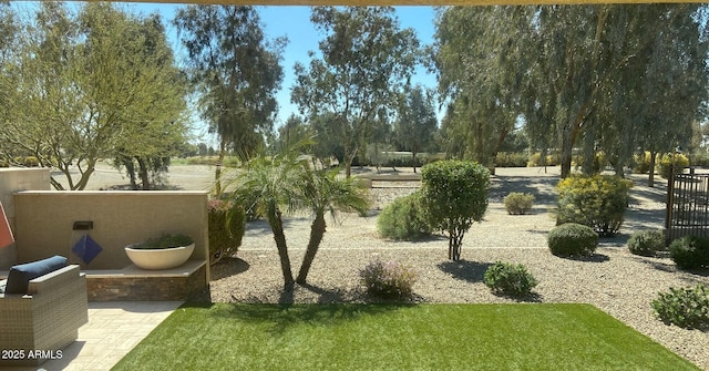 view of property's community featuring fence