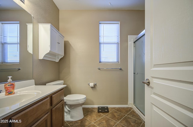 25659 W Forest Grove Ave, Buckeye, AZ 85326 - full bath featuring vanity, a shower with door, healthy amount of natural light, and toilet